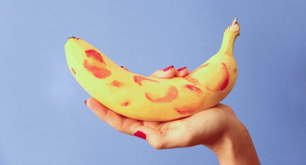 Banana with lipstick kiss marks on it
